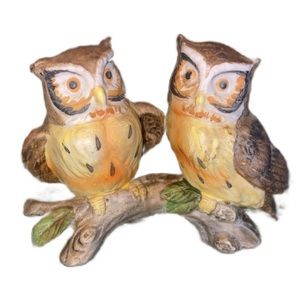 Miniature Ceramic Owls Sitting On A Branch